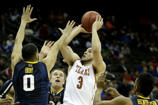 Texas Romps Past West Virginia 66-49 in Big 12s