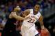 KANSAS CITY, MO - MARCH 13: Andrew Wiggins #22 of the Kansas Jayhawks drives upcourt as Marcus Smart #33 of the Oklahoma State Cowboys defends during the Big 12 Basketball Tournament quarterfinal game at Sprint Center on March 13, 2014 in Kansas City, Missouri. (Photo by Jamie Squire/Getty Images)
