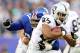 EAST RUTHERFORD, NJ - NOVEMBER 10: Rashad Jennings #27 of the Oakland Raiders carries the ball as Linval Joseph #97 of the New York Giants defends at MetLife Stadium on November 10, 2013 in East Rutherford, New Jersey. (Photo by Elsa/Getty Images)