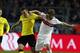 Dortmund's Kevin Grosskreutz, center, and Stuttgart's Timo Werner challenge for the ball during the German first division Bundesliga soccer match between BvB Borussia Dortmund and VfB Stuttgart in Dortmund, Germany, Friday, Nov. 1, 2013. (AP Photo/Frank Augstein)