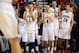 LAS VEGAS, NV - MARCH 13: (L-R) Gabe York #1, T.J. McConnell #4, Kaleb Tarczewski #35 and Elliott Pitts #24 of the Arizona Wildcats applaud as they watch teammates play in the final moments of their quarterfinal game of the Pac-12 Basketball Tournament against the Utah Utes at the MGM Grand Garden Arena on March 13, 2014 in Las Vegas, Nevada. Arizona won 71-39. (Photo by Ethan Miller/Getty Images)