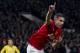 Manchester United's Robin van Persie celebrates after scoring against Arsenal during their English Premier League soccer match at Old Trafford Stadium, Manchester, England, Saturday Nov. 10, 2013. (AP Photo/Jon Super)