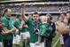 Ireland's Brian O'Driscoll and daughter Sadie leave the pitch after he played his last home game during during their Six Nations Rugby Union match against Italy at the Aviva Stadium, Dublin, Ireland, Saturday, March 8, 2014. (AP Photo/Peter Morrison)