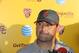 Southern California coach Steve Sarkisian takes questions from members of the media after spring practice for the NCAA college football team in Los Angeles, Thursday, March 13, 2014. (AP Photo/Damian Dovarganes)