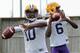 Anthony Jennings (left) throws with Brandon Harris (right) during LSU's first week of spring practice.