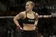 Ronda Rousey reacts after defeating Sara McMann following a UFC 170 mixed martial arts women's bantamweight title bout on Saturday, Feb. 22, 2014, in Las Vegas. (AP Photo/Isaac Brekken)