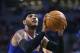 New York Knicks forward Carmelo Anthony (7) shoots a free throw during the second half of an NBA basketball game against the Boston Celtics in Boston, Wednesday, March 12, 2014. (AP Photo/Elise Amendola)