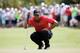 DORAL, FL - MARCH 09: Tiger Woods lines up a putt on the first green during the final round of the World Golf Championships-Cadillac Championship at Trump National Doral on March 9, 2014 in Doral, Florida. (Photo by Chris Trotman/Getty Images)