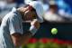 INDIAN WELLS, CA - MARCH 14: Novak Djokovic of Serbia reacts after winning a point against Julien Benneteau of France during the BNP Paribas Open at Indian Wells Tennis Garden on March 14, 2014 in Indian Wells, California. (Photo by Jeff Gross/Getty Images)