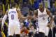 Oklahoma City Thunder guard Russell Westbrook (0) and forward Serge Ibaka (9) celebrate in the fourth quarter of an NBA basketball game against the San Antonio Spurs in Oklahoma City, Wednesday, Nov. 27, 2013. Oklahoma City won 94-88. (AP Photo/Sue Ogrocki)