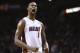 Miami Heat's Chris Bosh reacts after LeBron James scored a three point shot during the second half of an NBA basketball game in Miami, Monday, March 10, 2014 against the Washington Wizards. The Heat won 99-90. (AP Photo/J Pat Carter)