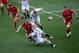 LONDON, ENGLAND - MARCH 09: Jonathan Davies of Wales is tackled by Jack Nowell and Danny Care of England during the RBS Six Nations match between England and Wales at Twickenham Stadium on March 9, 2014 in London, England. (Photo by David Cannon/Getty Images)