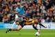 HULL, ENGLAND - MARCH 15: Nikica Jelavic of Hull City is brought down by Vincent Kompany of Manchester City during the Barclays Premier league match between Hull City and Manchester City at KC Stadium on March 15, 2014 in Hull, England. Kompany was shown the red card for this chalenge. (Photo by Paul Thomas/Getty Images)