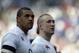 England's Mike Brown, right, and teammate Luther Burrell walk on the pitch at the end of the Six Nations international rugby union match between Italy and England at Rome's Olympic stadium, Saturday, March 15, 2014. (AP Photo/Gregorio Borgia)