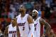 MIAMI, FL - MARCH 14: LeBron James #6, Dwyane Wade #3 and Mario Chalmers #15 of the Miami Heat look on during a game against the Denver Nuggets at American Airlines Arena on March 14, 2014 in Miami, Florida. NOTE TO USER: User expressly acknowledges and agrees that, by downloading and/or using this photograph, user is consenting to the terms and conditions of the Getty Images License Agreement. Mandatory copyright notice: (Photo by Mike Ehrmann/Getty Images)