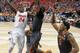Florida forward Casey Prather (24) shoots against Tennessee forward Jarnell Stokes (5) during the second half of an NCAA college basketball game in the semifinal round of the Southeastern Conference men's tournament, Saturday, March 15, 2014, in Atlanta. Florida won 56-49. (AP Photo/John Bazemore)