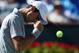 INDIAN WELLS, CA - MARCH 14: Novak Djokovic of Serbia reacts after winning a point against Julien Benneteau of France during the BNP Paribas Open at Indian Wells Tennis Garden on March 14, 2014 in Indian Wells, California. (Photo by Jeff Gross/Getty Images)