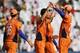 Netherlands' Pieter Seelaar, center, celebrates with fellow team members after the dismissal of Ireland's Paul Stirling during a Cricket World Cup match between Ireland and Netherlands in Calcutta, India, Friday, March 18, 2011. (AP Photo/Bikas Das)