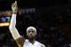 Miami Heat forward LeBron James (6) celebrates after scoring against the Denver Nuggets during the first half of an NBA basketball game in Miami, Friday, March 14, 2014. (AP Photo/Alan Diaz)