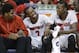 Louisville guard Russ Smith (2) laughs on the bench with Terry Rozier (0) during the final minutes of Louisville's 94-65 win over Houston in an NCAA college basketball game in the semifinals of the American Athletic Conference men's tournament Friday, March 14, 2014, in Memphis, Tenn. Smith led Louisville with 42 points. (AP Photo/Mark Humphrey)