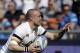 England's Mike Brown celebrates after scoring a try during the Six Nations Rugby Union match between Italy and England at Rome's Olympic stadium, Saturday, March 15, 2014. (AP Photo/Gregorio Borgia)