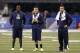 INDIANAPOLIS, IN - FEBRUARY 23: Quarterbacks (from left) Teddy Bridgewater, Johnny Manziel and Derek Carr look on as they sit out workouts during the 2014 NFL Combine at Lucas Oil Stadium on February 23, 2014 in Indianapolis, Indiana. (Photo by Joe Robbins/Getty Images)