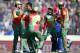 Bangladesh's bowler Shakib Al Hasan, second from left, celebrates with teammates the dismissal of Afghanistan's batsman Najibullah Taraki during their ICC Twenty20 Cricket World Cup opening match in Dhaka, Bangladesh, Sunday, March 16, 2014. (AP Photo/Aijaz Rahi)