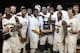 Baylor's Pierre Jackson (55) and A.J. Walton (22) celebrate with teammates after the NIT championship college basketball game against Iowa on Thursday, April 4, 2013, in New York. Baylor won 74-54. (AP Photo/Frank Franklin II)