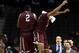 NEW YORK, NY - MARCH 12: Travion Leonard #2 and Ryan Rhoomes #30 of the Fordham Rams celebrate after a shot by Leonard in the second half against the George Mason Patriots during the first round of the Atlantic 10 Men's Basketball Tournament at Barclays Center on March 12, 2014 in the Brooklyn Borough of New York City. (Photo by Mike Lawrie/Getty Images)