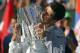 Novak Djokovic, of Serbia, kisses the trophy after he beat Roger Federer, of Switzerland, 3-6, 6-3, 7-6 to win the final match of the BNP Paribas Open tennis tournament, Sunday, March 16, 2014, in Indian Wells, Calif. (AP Photo/Mark J. Terrill)