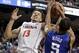 Virginia's Anthony Gill (13) and Duke's Rodney Hood (5) battle for a rebound during the second half of an NCAA college basketball game in the championship of the Atlantic Coast Conference tournament in Greensboro, N.C., Sunday, March 16, 2014. (AP Photo/Bob Leverone)