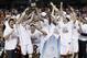 Virginia players celebrate with the trophy after defeating Duke in an NCAA college basketball game in the championship of the Atlantic Coast Conference tournament in Greensboro, N.C., Sunday, March 16, 2014. Virginia won 72-63. (AP Photo/Gerry Broome)