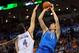Mar 16, 2014; Oklahoma City, OK, USA; Dallas Mavericks forward Dirk Nowitzki (41) attempts a shot against Oklahoma City Thunder forward Nick Collison (4) during the second quarter at Chesapeake Energy Arena. Mandatory Credit: Mark D. Smith-USA TODAY Sports