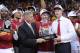 Mar 15, 2014; Kansas City, MO, USA; The Big 12 commissioner Bob Bowslby presents Iowa State Cyclones head coach Fred Hoiberg and players the championship trophy after the game against the Baylor Bears in the championship game of the Big 12 Conference college basketball tournament at Sprint Center. The Cyclones won 74 - 65. Mandatory Credit: Denny Medley-USA TODAY Sports