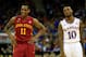KANSAS CITY, MO - MARCH 14: Monte Morris #11 of the Iowa State Cyclones smiles as he stands next to a dejected Naadir Tharpe #10 of the Kansas Jayhawks during the Big 12 Basketball Tournament semifinal game at Sprint Center on March 14, 2014 in Kansas City, Missouri. (Photo by Jamie Squire/Getty Images)