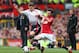 MANCHESTER, ENGLAND - MARCH 16: Jon Flanagan of Liverpool competes with Juan Mata of Manchester United during the Barclays Premier League match between Manchester United and Liverpool at Old Trafford on March 16, 2014 in Manchester, England. (Photo by Alex Livesey/Getty Images)