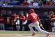 St. Louis Cardinals' Oscar Taveras doubles during the second inning of an exhibition spring training baseball game against the New York Mets Friday, March 7, 2014, in Port St. Lucie, Fla. (AP Photo/Jeff Roberson)