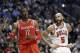 Houston Rockets forward Dwight Howard (12) talks to teammates during the second half of an NBA basketball game against the Chicago Bulls in Chicago on Thursday, March 13, 2014. The Bulls won 111-87. (AP Photo/Nam Y. Huh)