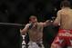 Kenny Robertson, left, fights Aaron Simpson during a UFC on Fuel 4 Mixed Martial Arts welterweight bout in San Jose, Calif., Wednesday, July 11, 2012. (AP Photo/Jeff Chiu)