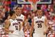 TUCSON, AZ - FEBRUARY 26: (L-R) Nick Johnson #13, Aaron Gordon #11 and Kaleb Tarczewski #35 of the Arizona Wildcats react after scoring against the California Golden Bears during the second half of the college basketball game at McKale Center on February 26, 2014 in Tucson, Arizona. The Wildcats defeated the Golden Bears 87-59. (Photo by Christian Petersen/Getty Images)