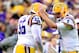BATON ROUGE, LA - NOVEMBER 23: Quarterback Zach Mettenberger #8 of the LSU Tigers celebrates with offensive guard Trai Turner #56 after passing for a touchdown against the Texas A&M Aggies at Tiger Stadium on November 23, 2013 in Baton Rouge, Louisiana. (Photo by Sean Gardner/Getty Images)