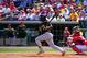 Mar 16, 2014; Clearwater, FL, USA; Pittsburgh Pirates center fielder Andrew McCutchen (22) hits an RBI single in the fifth inning against the Philadelphia Phillies in a spring training exhibition at Bright House Field. Mandatory Credit: David Manning-USA TODAY Sports