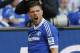 Schalke's Klaas-Jan Huntelaar of the Netherlands celebrates after scoring during the German first division Bundesliga soccer match between Schalke 04 and 1899 Hoffenheim in Gelsenkirchen, Germany, Saturday, March 8, 2014. (AP Photo/Frank Augstein)