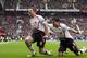 Liverpool strengthened their title chances with victory at Man Utd.
