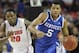 Kentucky guard Andrew Harrison (5) runs on Florida guard Michael Frazier II (20) during the first half of an NCAA college basketball game in the Championship round of the Southeastern Conference men's tournament, Sunday, March 16, 2014, in Atlanta. (AP Photo/Steve Helber)