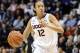 Connecticut's Saniya Chong dribbles the ball during the first half of an NCAA college basketball game against Rutgers in the semifinals of the American Athletic Conference women's basketball tournament, Sunday, March 9, 2014, in Uncasville, Conn. (AP Photo/Jessica Hill)