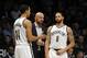 Brooklyn Nets coach Jason Kidd talks with Shaun Livingston (14) and Deron Williams (8) during an NBA basketball game against the Sacramento Kings on Sunday, March 9, 2014 at Barclays Center in New York. (AP Photo/Kathy Kmonicek)