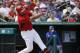 St. Louis Cardinals' Jhonny Peralta singles to score teammate Randal Grichuk in the fifth inning of an exhibition spring training baseball game against the New York Mets, Sunday, March 16, 2014, in Jupiter, Fla. (AP Photo/David Goldman)