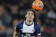 Paris Saint Germain's Edinson Cavani of Uruguay looks at the ball during their French League One soccer match against Marseille, at the Parc des Princes stadium, in Paris, Sunday, March 2 , 2014. (AP Photo/Lionel Cironneau)