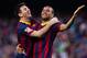 BARCELONA, SPAIN - MARCH 16: Lionel Messi of FC Barcelona celebrates with his teammate Daniel Alves after scoring his team's sixth goal during the La Liga match between FC Barcelona and CA Osasuna at Camp Nou on March 16, 2014 in Barcelona, Spain. (Photo by Alex Caparros/Getty Images)